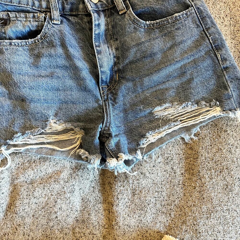 KanCan High Rise Distressed Cutoff Denim Shorts Size W0 23 Raw Hem Blue - Picture 2 of 5